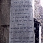 Amelia Edwards' Gravestone: HERE LIES THE BODY OF AMELIA ANN BLANFORD EDWARDS NOVELIST AND ARCHAEOLOGIST BORN IN LONDON ON THE 7TH JUNE 1831 DIED AT WESTON-SUPER-MARE ON THE 1ST APRIL 1892 WHO BY HER LABOURS ENRICHED THE THOUGHTS AND INTERESTS OF HER TIME